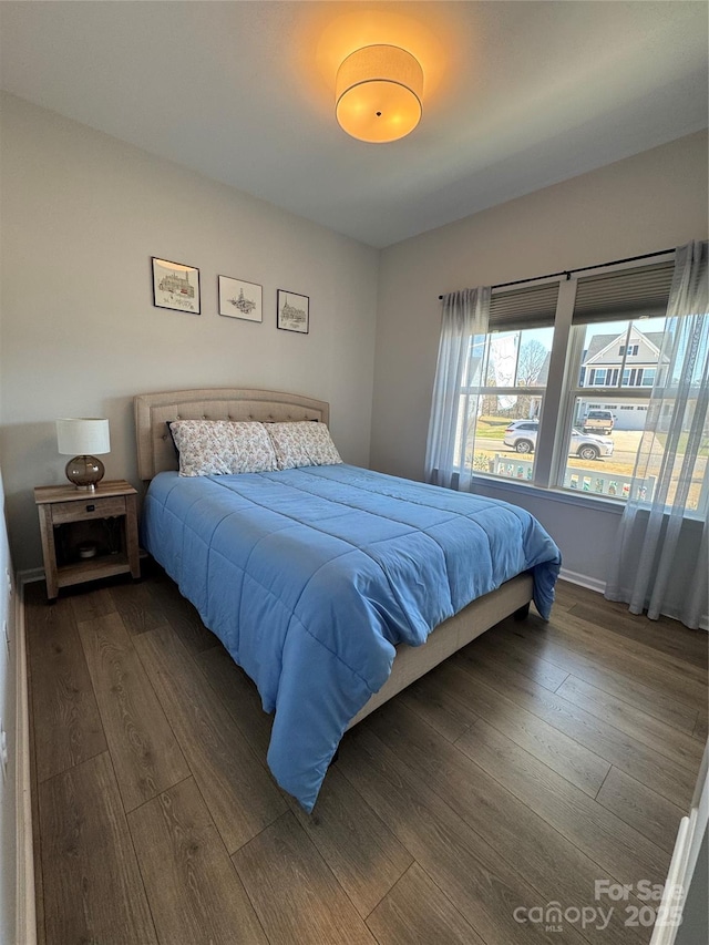 194 Tillery Ln, Mount Gilead, NC 27306 - bedroom with dark wood finished floors