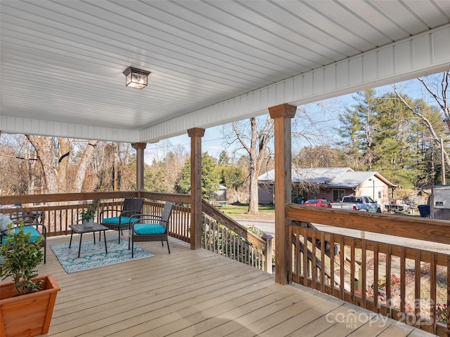 deck featuring covered porch