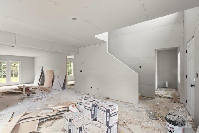unfurnished living room with plenty of natural light