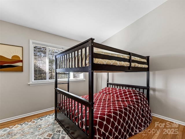 bedroom featuring hardwood / wood-style flooring