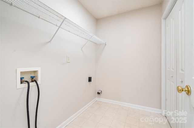 laundry room with laundry area, baseboards, washer hookup, and electric dryer hookup