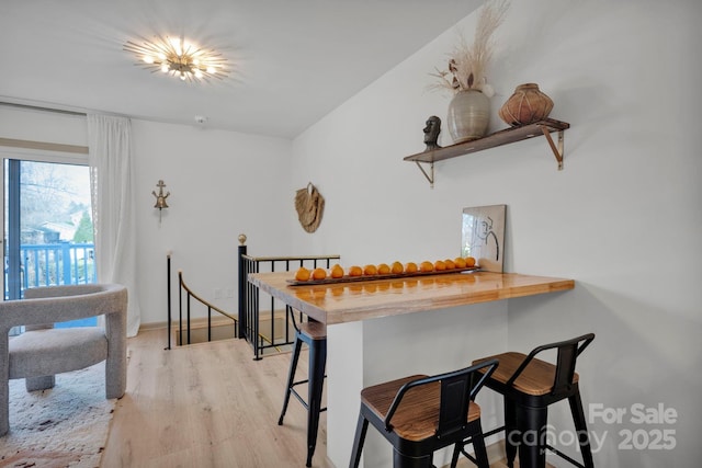 dining area featuring light wood-type flooring