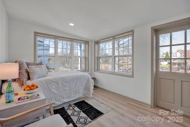 bedroom featuring light wood-type flooring