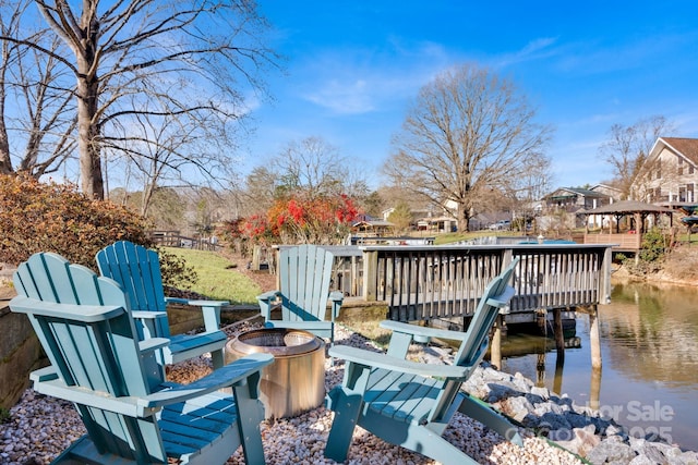 dock area with a water view