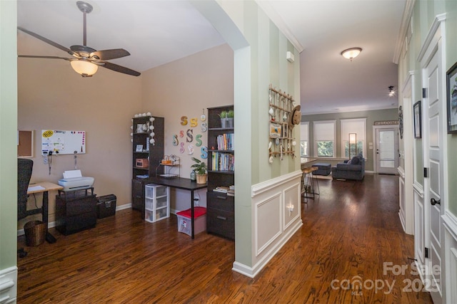 corridor featuring dark hardwood / wood-style floors and crown molding