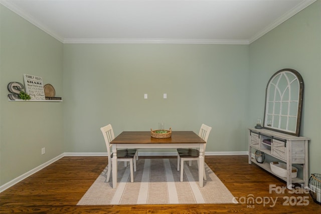 unfurnished dining area with dark hardwood / wood-style floors and ornamental molding