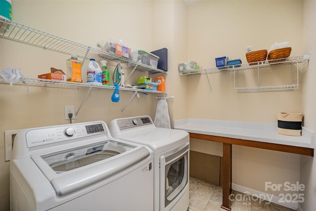 washroom featuring independent washer and dryer