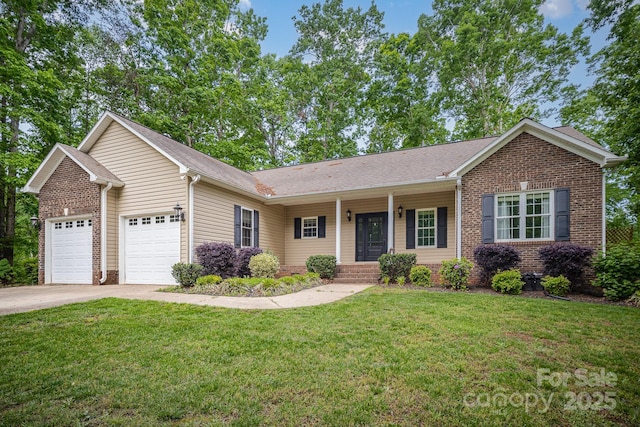 1313 Western Hills Ln, Vale, NC 28168 - ranch-style house featuring an attached garage, a front lawn, driveway, and brick siding