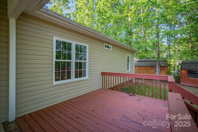 1313 Western Hills Ln, Vale, NC 28168 - deck featuring an outbuilding and a storage unit
