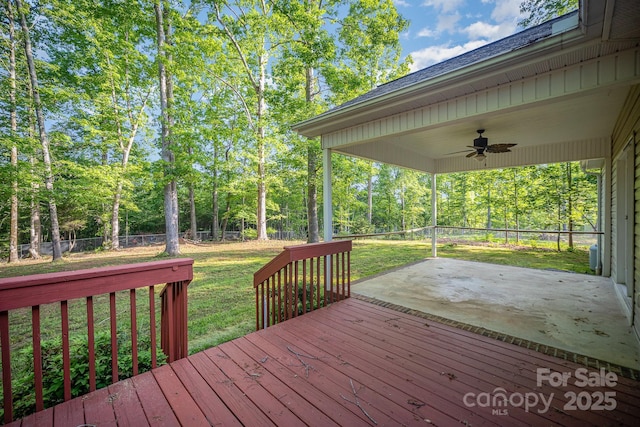 1313 Western Hills Ln, Vale, NC 28168 - wooden deck featuring a lawn, a patio, ceiling fan, and a fenced backyard
