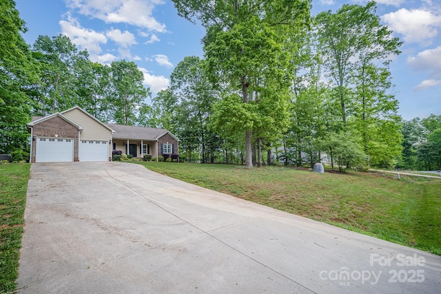 1313 Western Hills Ln, Vale, NC 28168 - single story home featuring brick siding, a garage, a front lawn, and concrete driveway