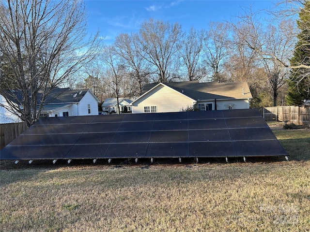 view of home's exterior featuring solar panels