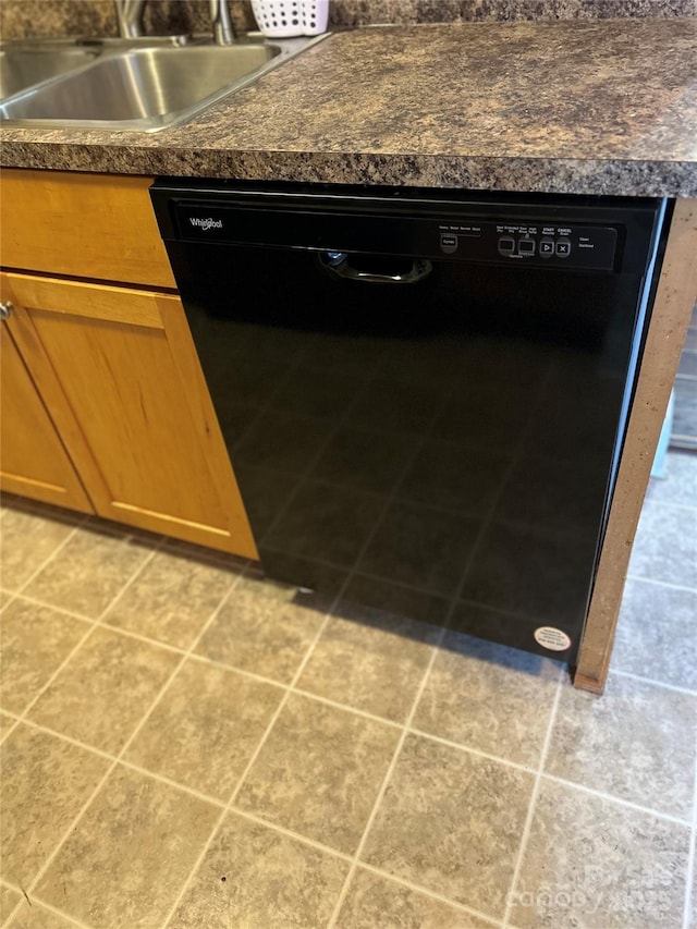 interior space with dishwasher and sink