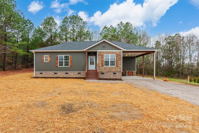 view of front of home featuring a carport