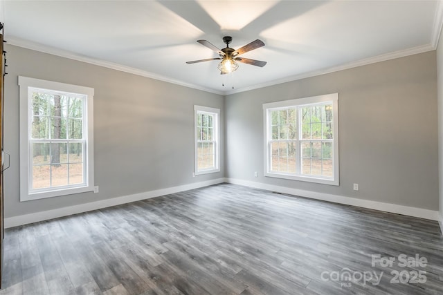 spare room with plenty of natural light, ornamental molding, and ceiling fan