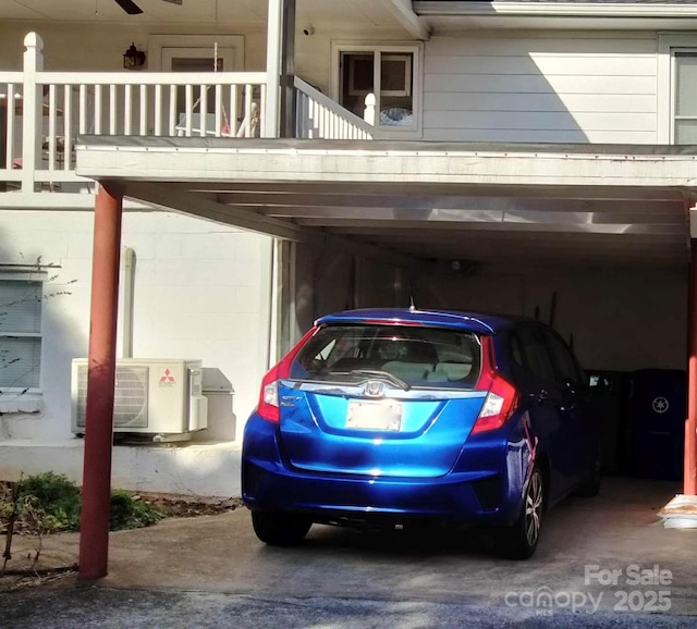 view of vehicle parking with a carport