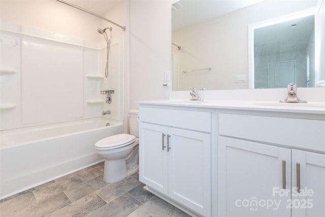 full bathroom with vanity, toilet, and bathtub / shower combination