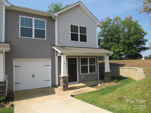 103 Gregory Ct, Weaverville, NC 28787 - view of front of house featuring an attached garage, covered porch, driveway, and roof with shingles