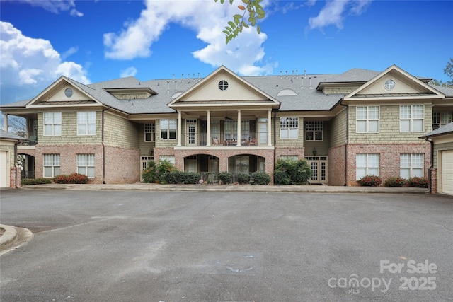 view of front of property with a balcony