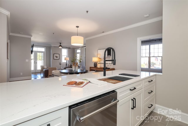 kitchen with dishwasher, french doors, white cabinetry, and light stone countertops