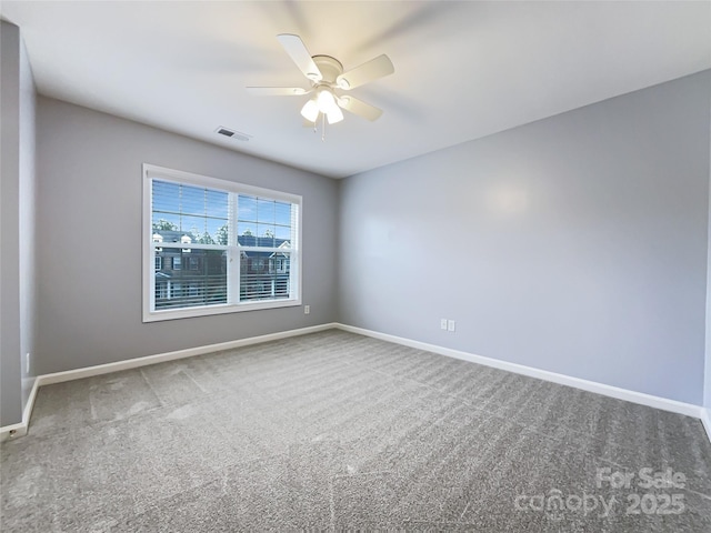 unfurnished room featuring carpet flooring and ceiling fan