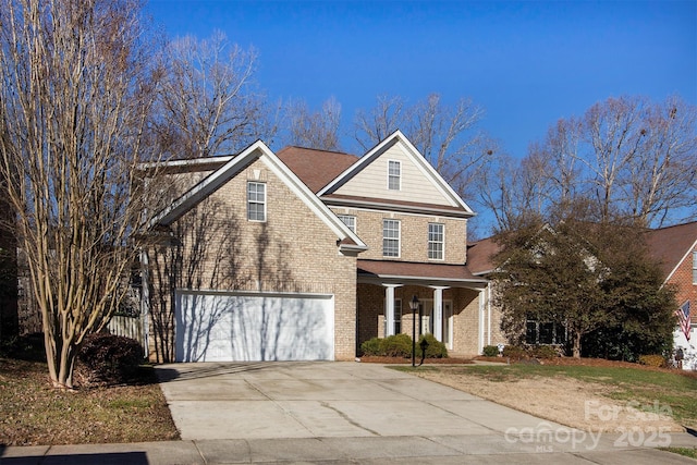 front of property with a garage