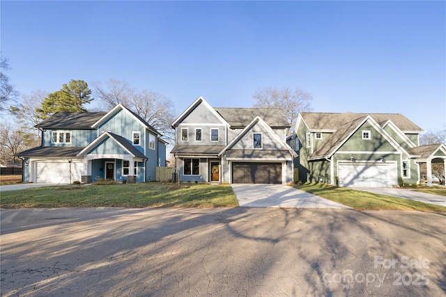 view of front of house with a garage and a front yard