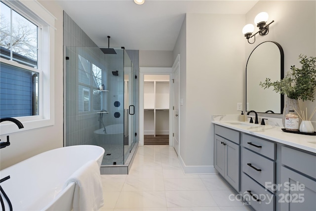 bathroom with tile patterned floors, vanity, and independent shower and bath