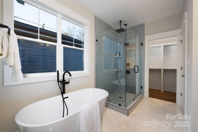 bathroom featuring plus walk in shower