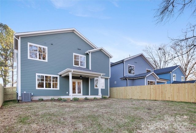 rear view of house with french doors and cooling unit