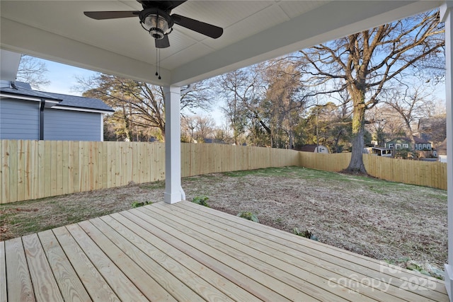 wooden deck with ceiling fan