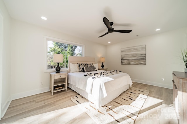 bedroom featuring ceiling fan and light wood-type flooring