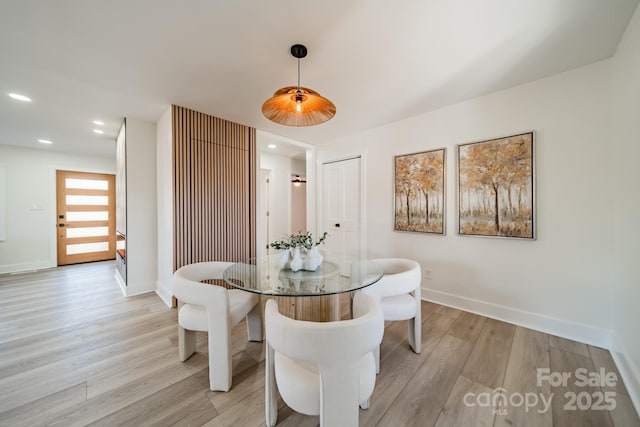 dining room with light hardwood / wood-style floors