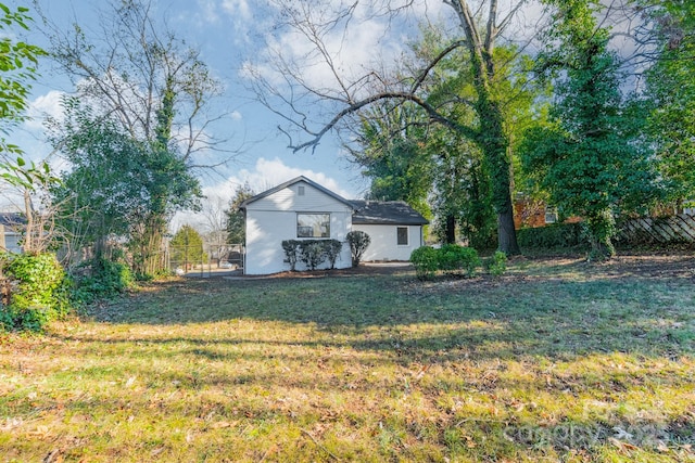 exterior space with a front yard