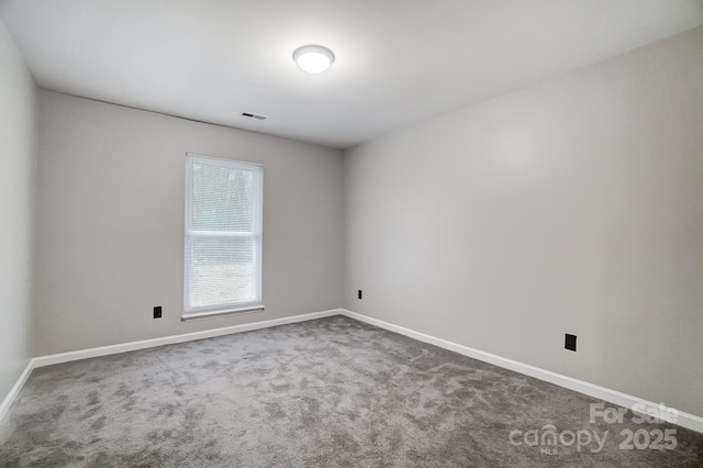 empty room with carpet floors