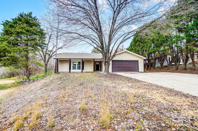 single story home with a garage