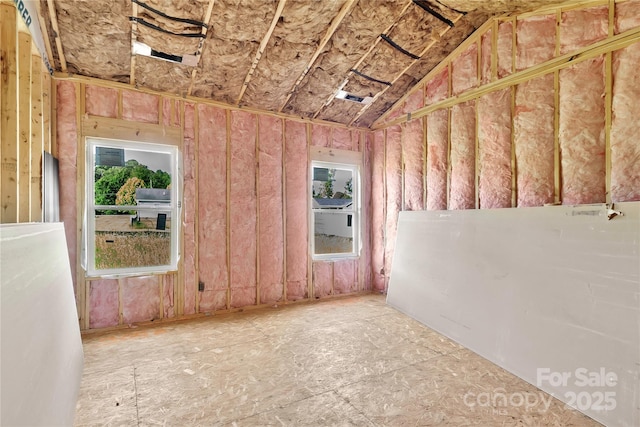 149 Tranquility Ln, Harmony, NC 28634 - spare room with plenty of natural light and lofted ceiling