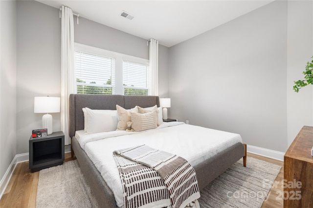 bedroom featuring hardwood / wood-style flooring