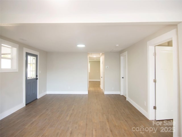 empty room featuring hardwood / wood-style floors