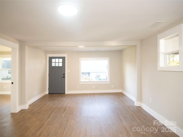 entrance foyer featuring hardwood / wood-style floors