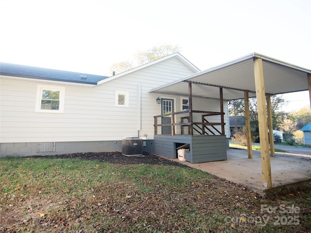 view of property exterior with a patio area and central air condition unit