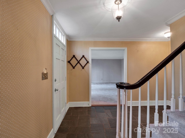 entrance foyer featuring crown molding