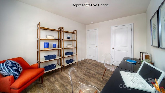 office space with dark hardwood / wood-style flooring