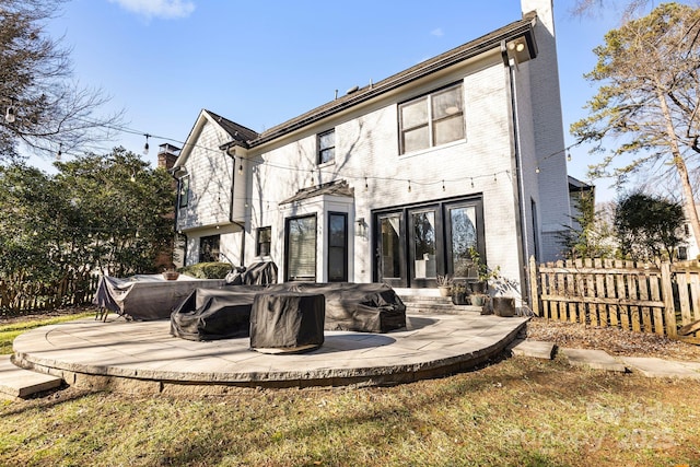 back of house with a patio area