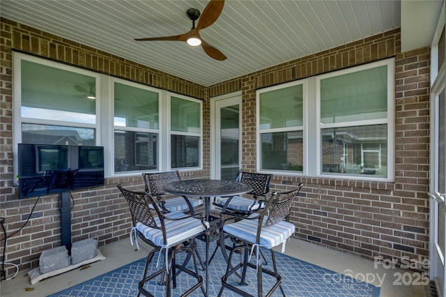 view of patio with ceiling fan