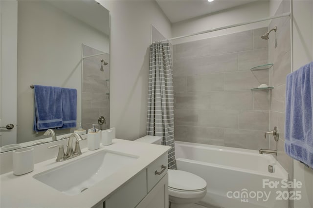 full bathroom with vanity, shower / bath combination with curtain, and toilet