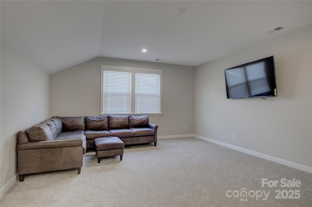 living room featuring light carpet and lofted ceiling