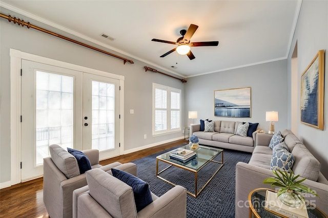 living room featuring ceiling fan, ornamental molding, dark wood-type flooring, and french doors