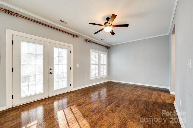 empty room with ceiling fan, french doors, dark wood-type flooring, and ornamental molding