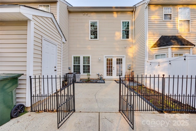 back of property featuring a patio and french doors